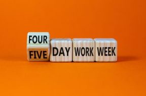 4 or 5 day work week symbol. Turned the cube and changed words ‘five day work week’ to ‘four day work week’. Beautiful orange background. Copy space. Business and 4 or 5 day work week concept.