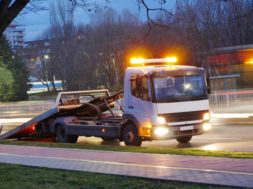 Long exposure shot of a road assistance truck on the boulevard.