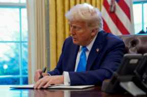 FILE PHOTO: U.S. President Donald Trump at the Oval Office in the White House